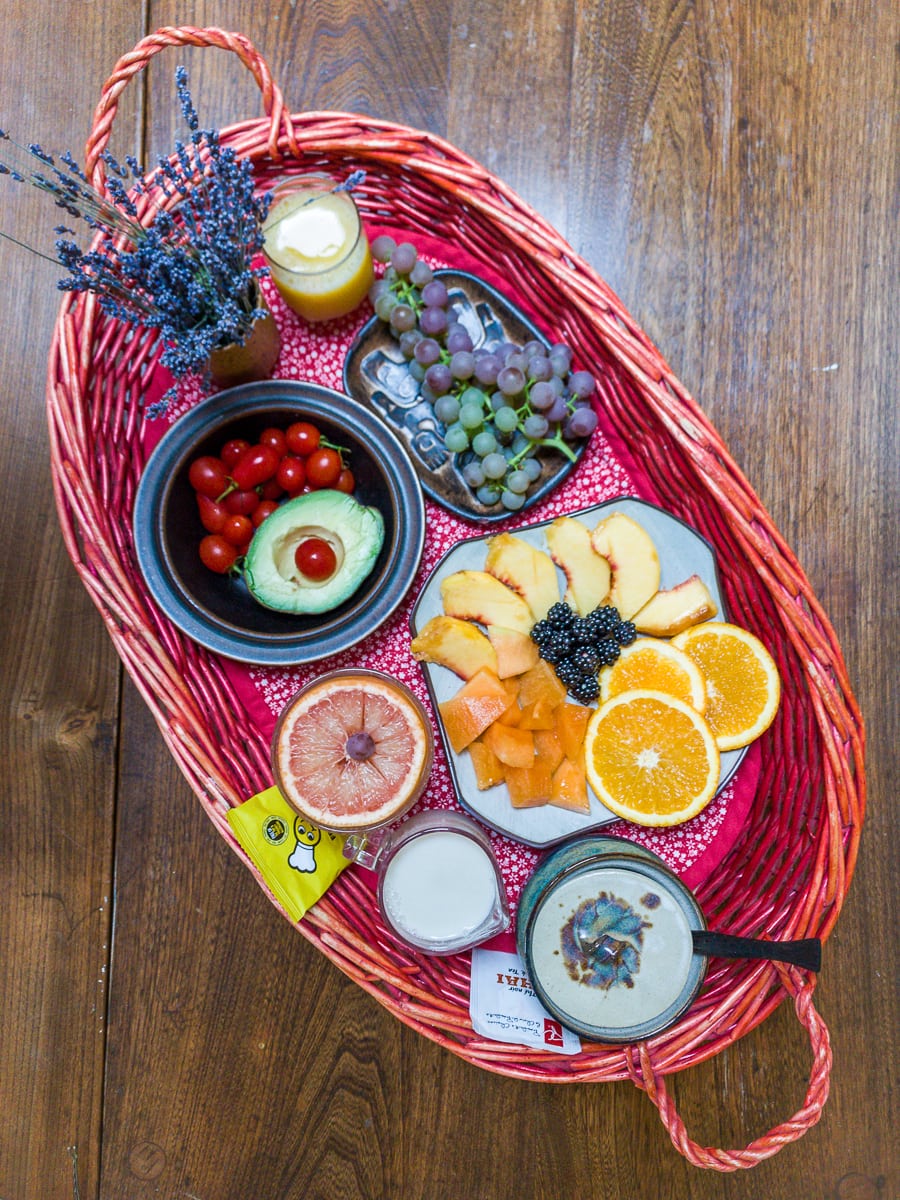 breakfast tray with fruit and tea